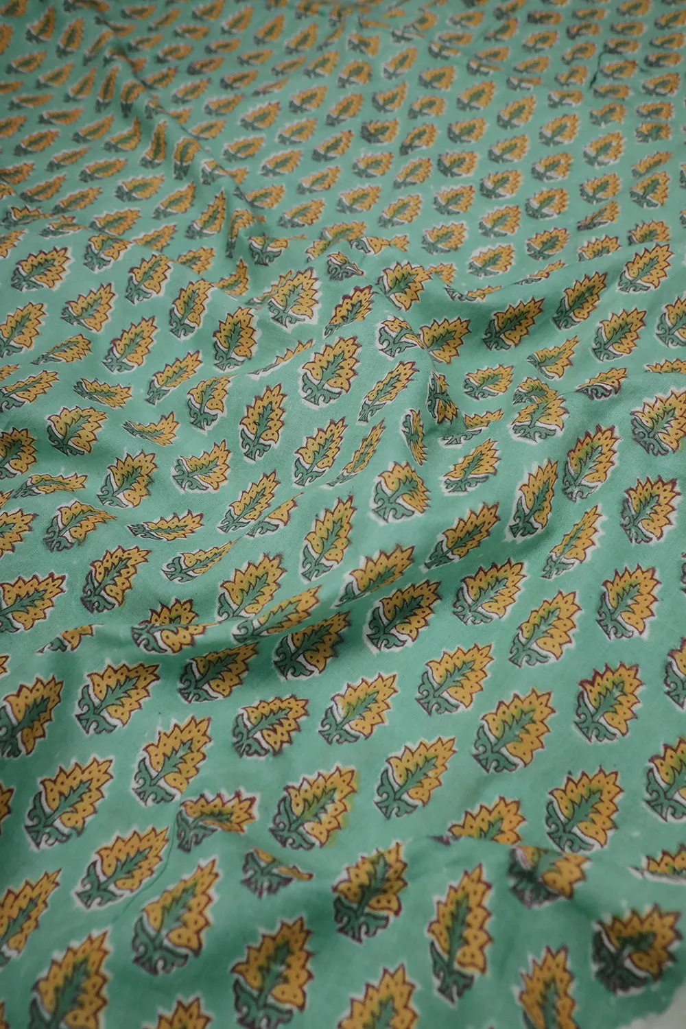 Yellow Motifs on Green Sanganeri Cotton Fabric